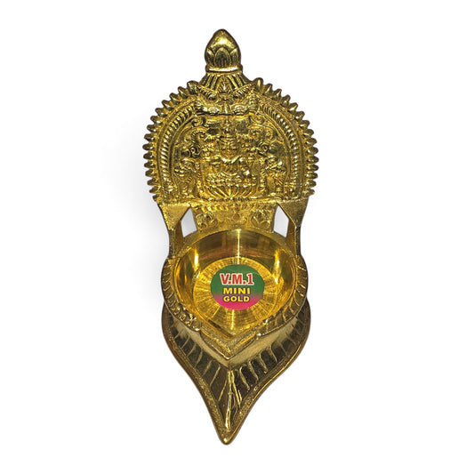 Traditional brass Kamatchi vilakku lamp for pooja room