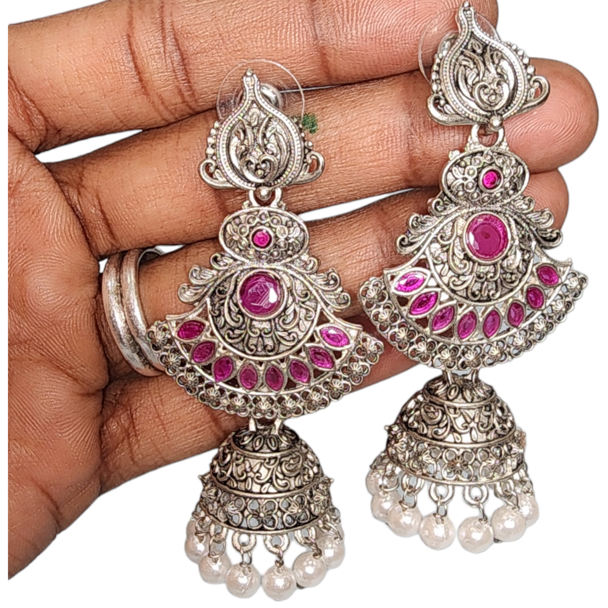 Beautiful traditional jumka earrings featuring intricate designs and vibrant colors, perfect for festive occasions.